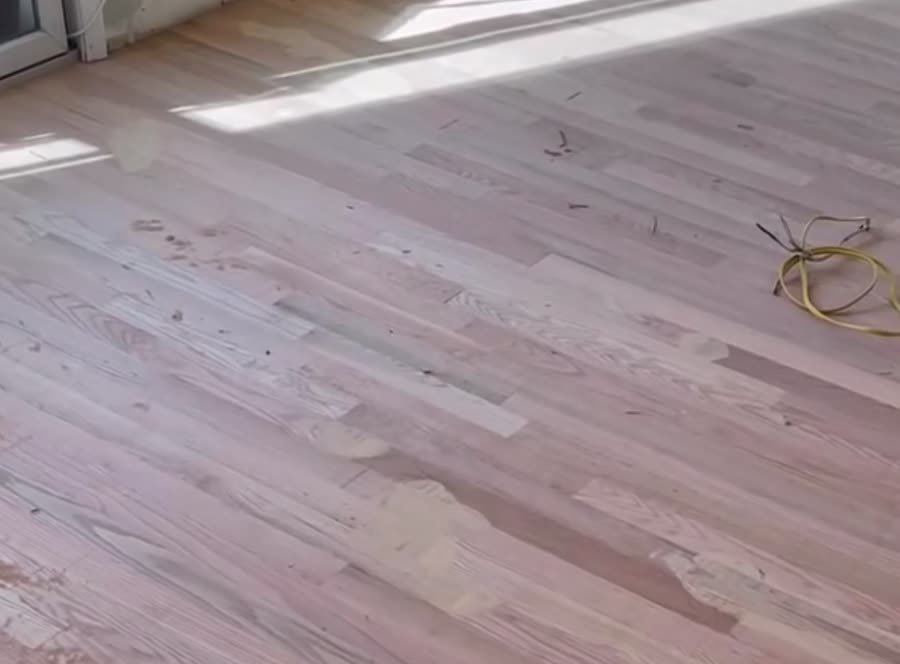 Freshly sanded light floor in sunlight